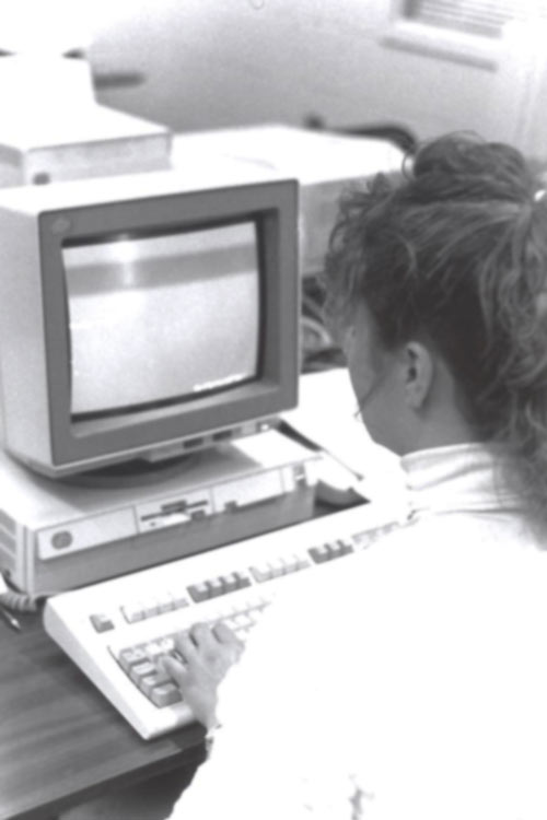 Student using computer in the 90's