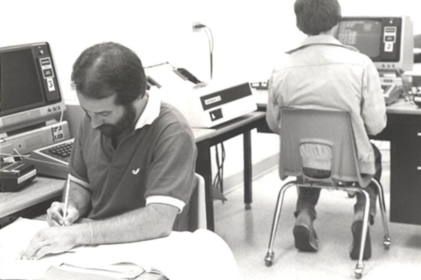 Two students using computers in the 90's
