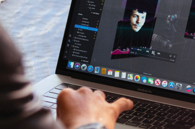 Person using a computer running simulation of a floating head 