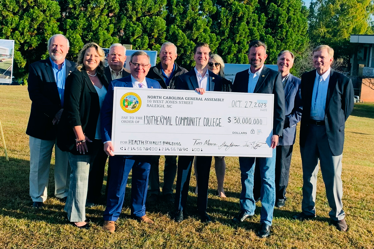 NC Legislators and representatives along with  Pres Annunziata and ICC Trustees proudly showing off the oversized check