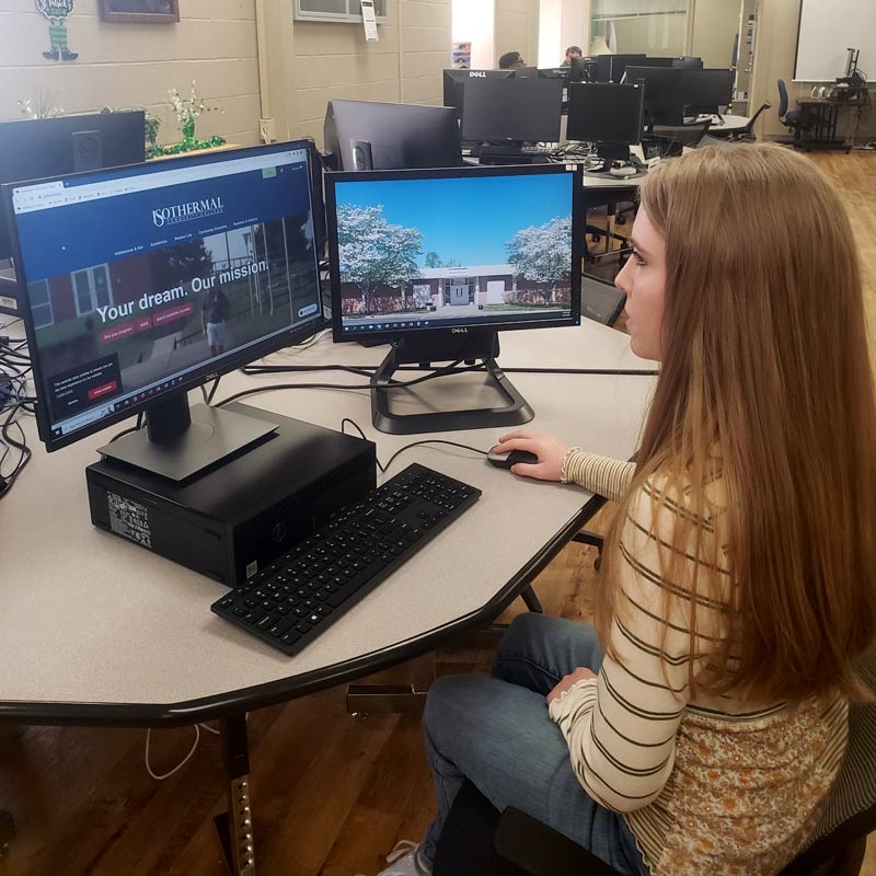 Girl in the computer lab at the computer