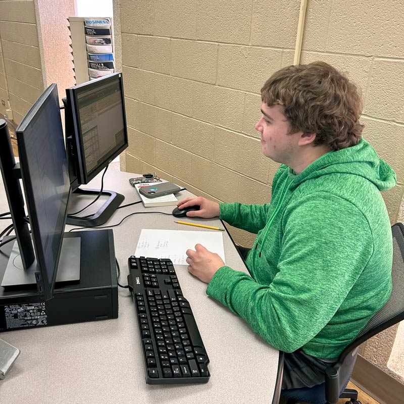 Student working at a computer