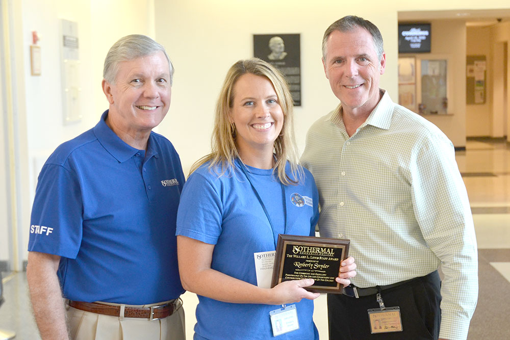 Willard L. Lewis Staff Award winner, Kimberly Snyder, receiving award with V.P. Stephen Matheny and President Walter Dalton.