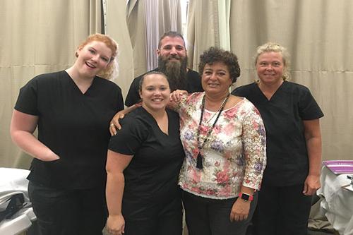 Four new massage therapists graduated