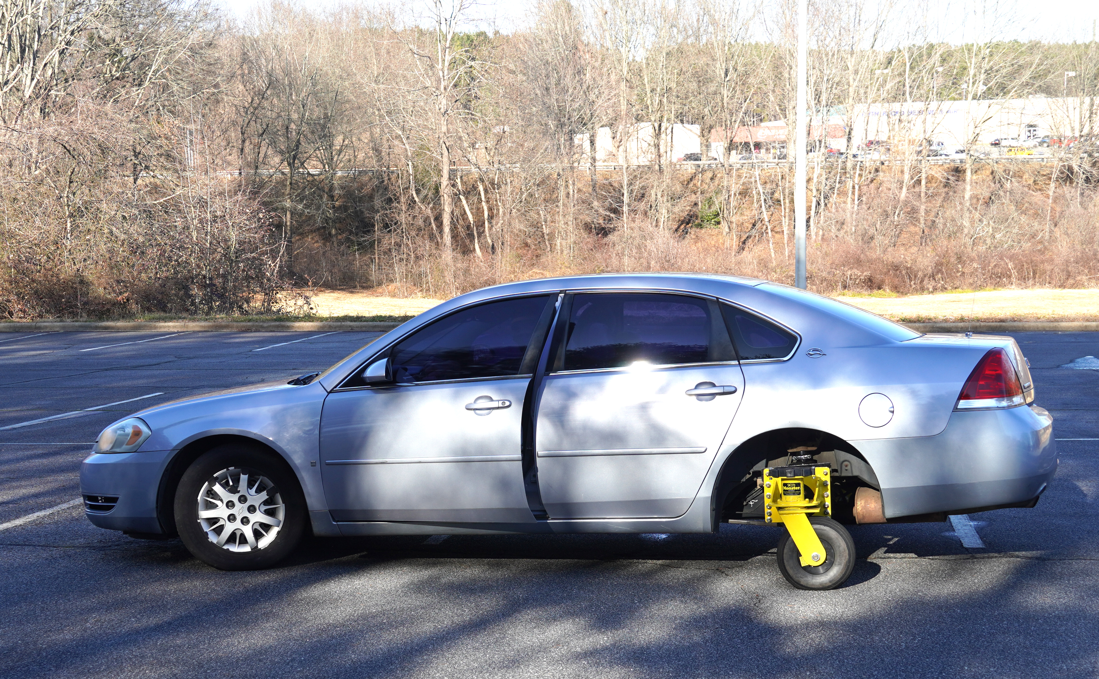 BLET Training car with Skid Monster attachment, a loosely spinning wheel on the back tire