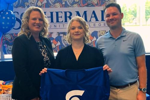 Lucas is pictured holding shirt with Sonoco logo with Dr. Margaret Annunziata, ICC’s president, and Ben Fuller.