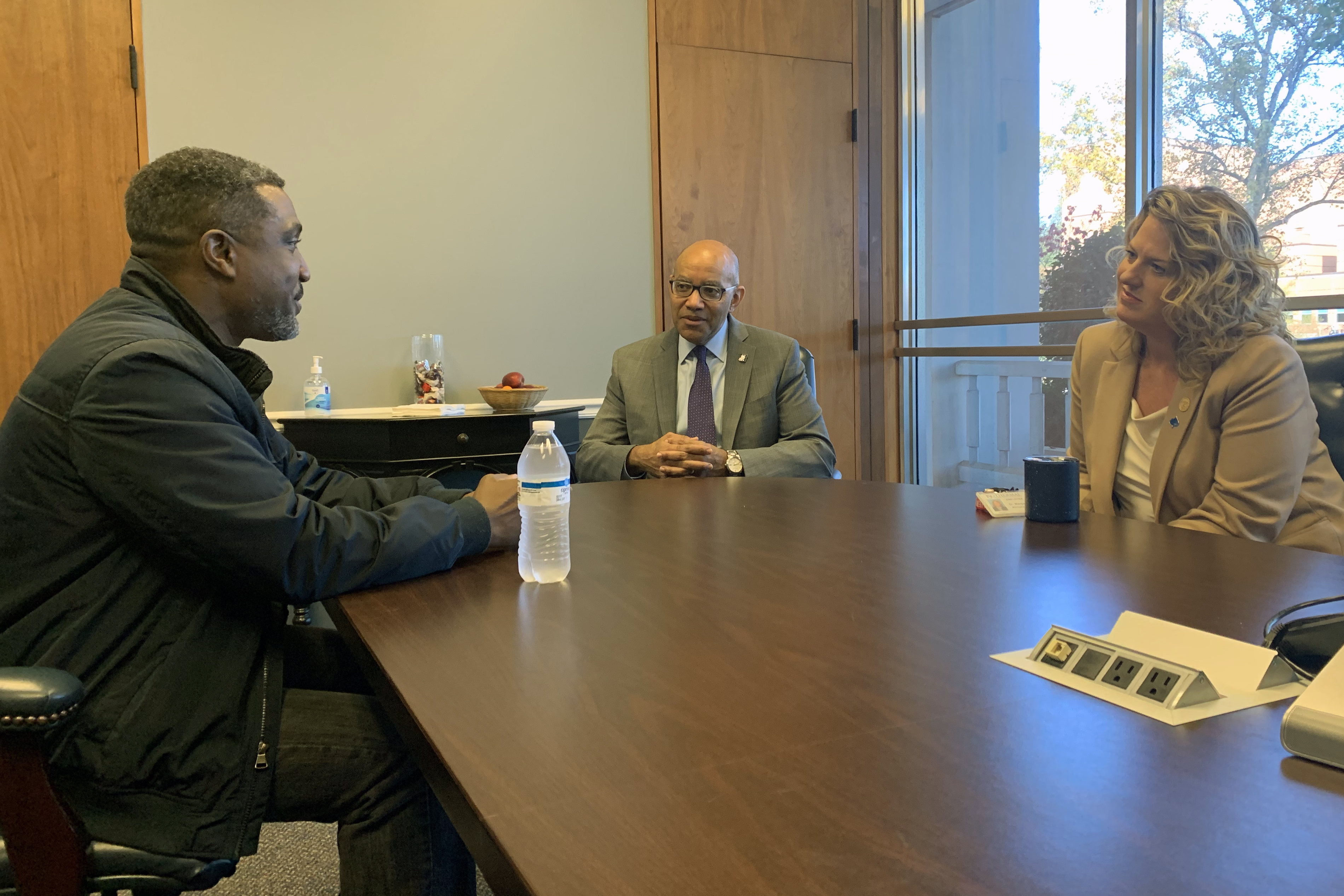 NCCCS President Stith engaging in conversation with ICC President Annunziata and Student Flemming.