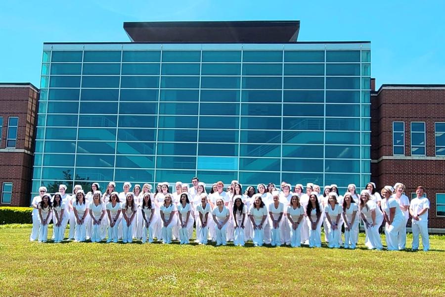 nurses pose in group photo