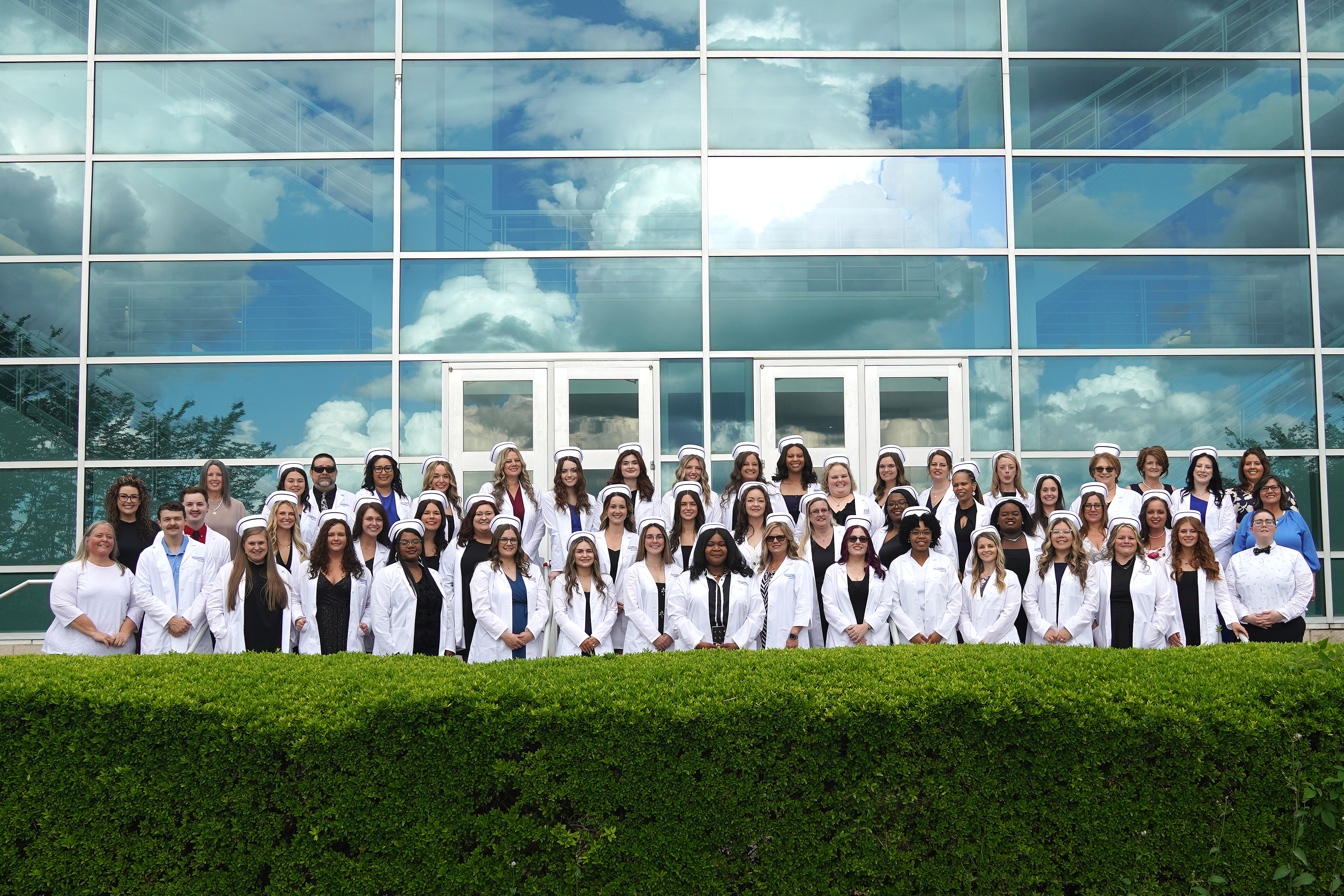 Group photo of graduating nursing students and faculty