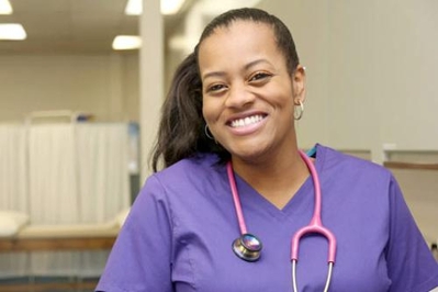 Stock image of nurse wearing scrubs with stethoscope Stock image of nurse wearing scrubs with stethoscope